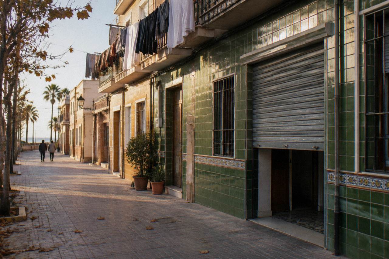 Colourful tiled facades on a quiet Valencia street in the late afternoon light