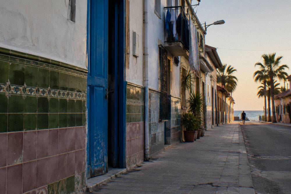 Colourful tiled facades on a quiet residential street in a seaside neighbourhood